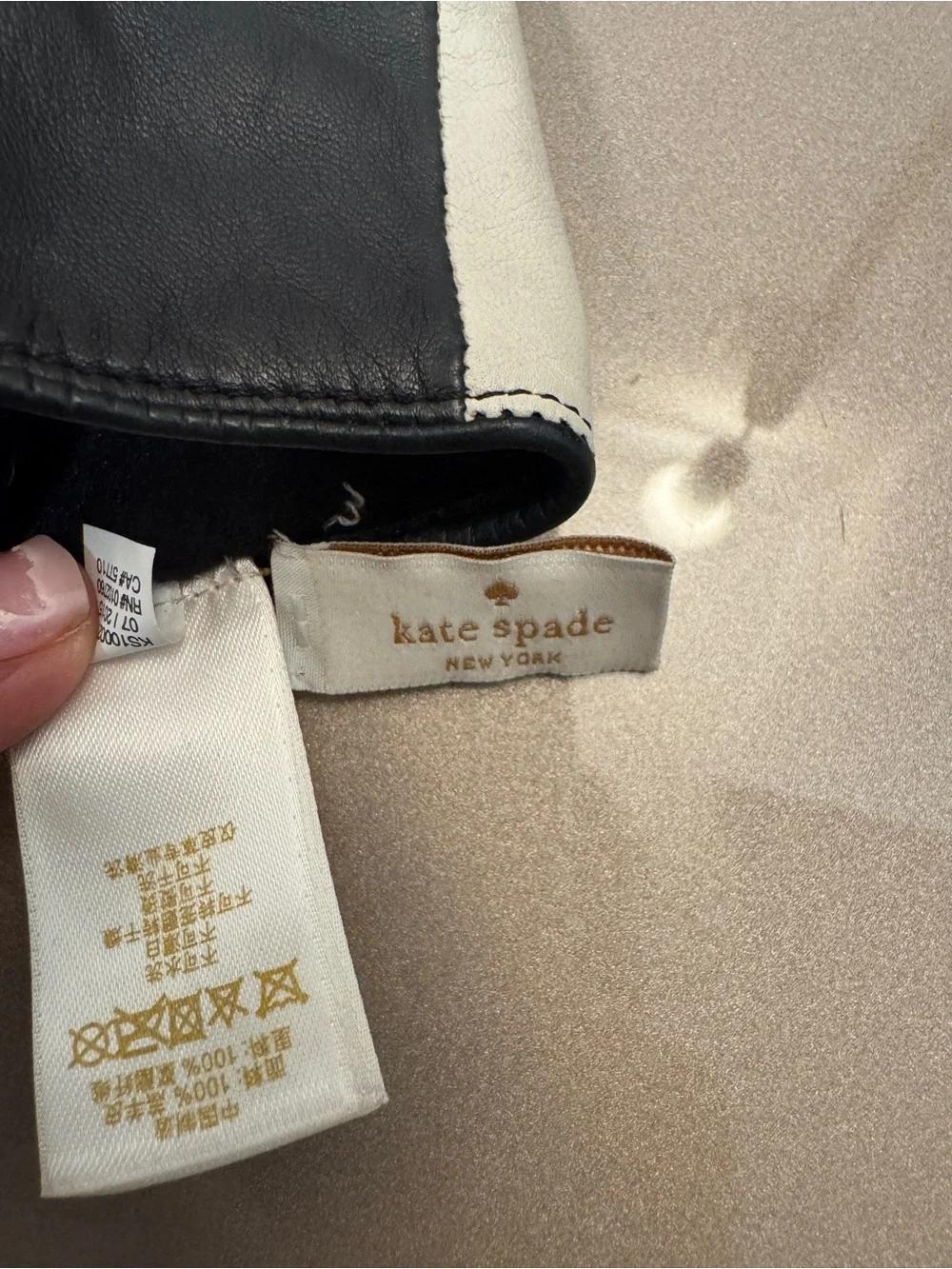 kate spade Two-Tone Leather Gloves in Cream and Black